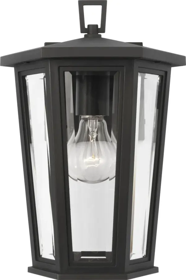 The Witley Small Wall Lantern combines contemporary geometric styling with traditional outdoor functionality. Its faceted clear glass and textured black frame create a striking visual statement while providing durable, wet-rated performance for any exterior space.