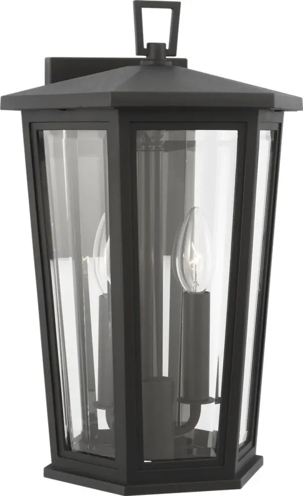 The Witley Medium Wall Lantern combines faceted clear glass with a textured black frame for striking outdoor illumination. Its geometric form and industrial charm make it perfect for contemporary homes seeking statement lighting. - alternate view