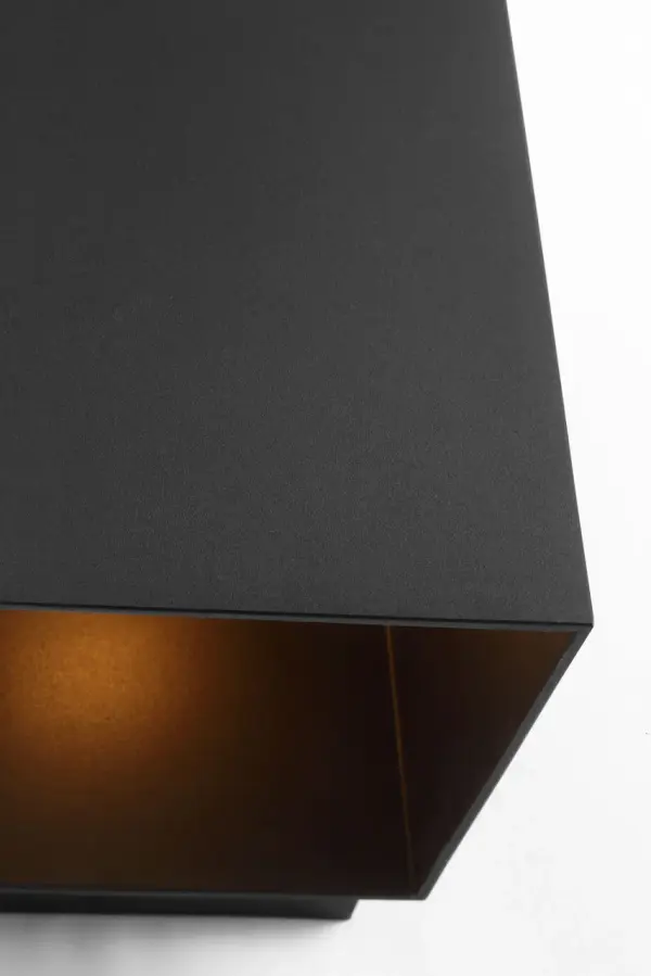 The Pohl StoneStrong lantern combines timeless design with weather-resistant construction. Its textured black finish and medium scale make it versatile for various outdoor applications, from residential porches to commercial entrances. - alternate view