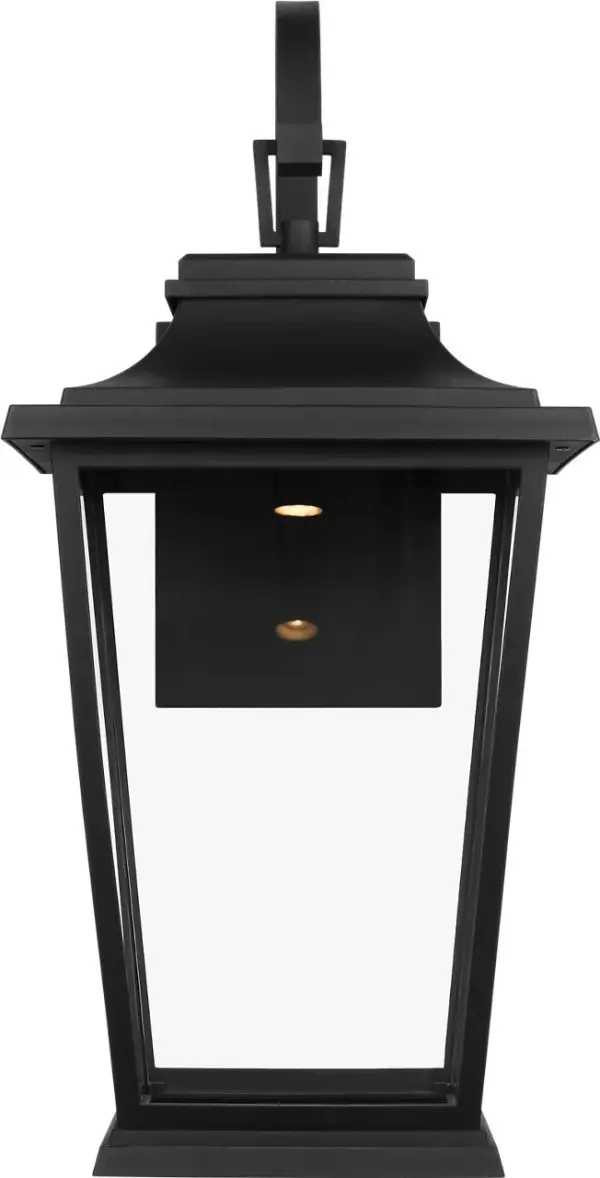 The Warren Large Wall Lantern combines traditional lantern styling with a durable textured black finish, making it ideal for creating a welcoming entrance or illuminating outdoor living spaces with classic elegance.