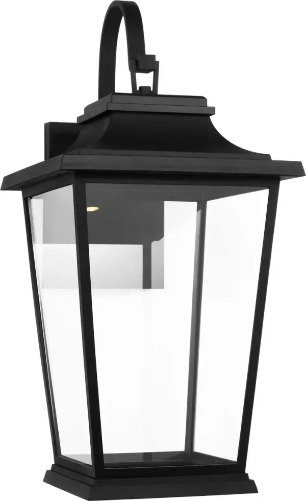 The Warren Extra Large Lantern delivers commanding presence with its oversized proportions and textured black finish. Perfect for grand entryways and commercial facades, this substantial fixture combines traditional lantern styling with durable outdoor construction. - alternate view