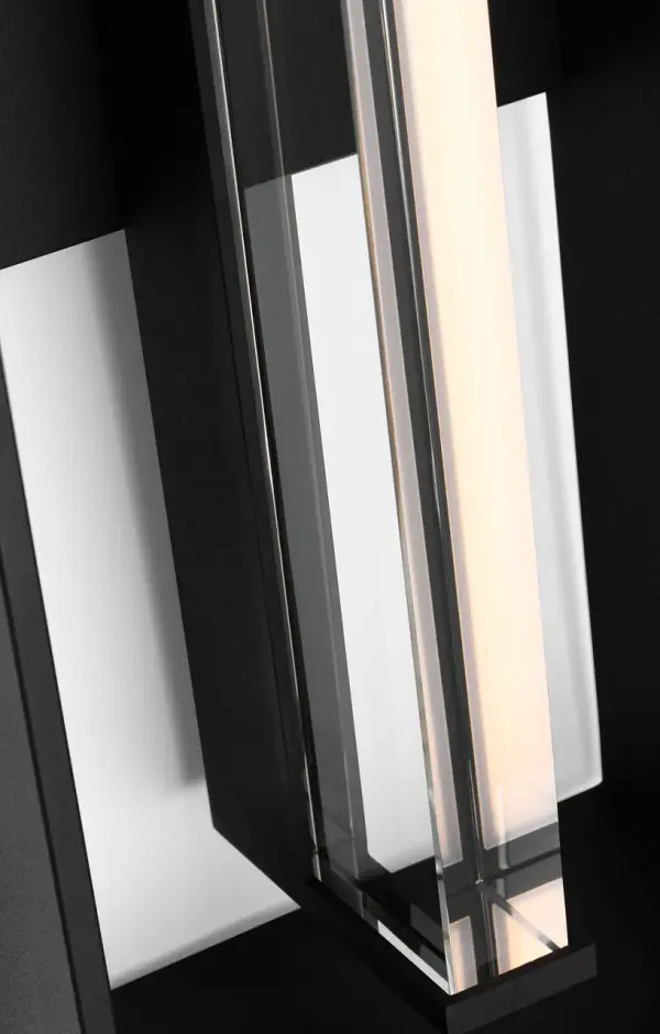 The Abner wall lantern makes a bold statement with its substantial 30-inch height and textured black finish. Perfect for large outdoor spaces requiring dramatic illumination and traditional elegance. - alternate view