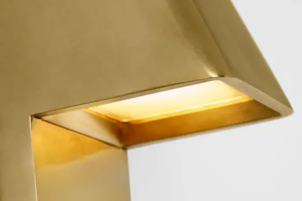 The Froler 36" Wall Sconce delivers grand-scale outdoor lighting with a minimalist, architectural approach. Its mud-in installation system creates seamless integration, while the shrouded shade provides precise downward illumination and soft plate glow. Ideal for expansive exterior walls requiring sophisticated, enduring lighting. - alternate view