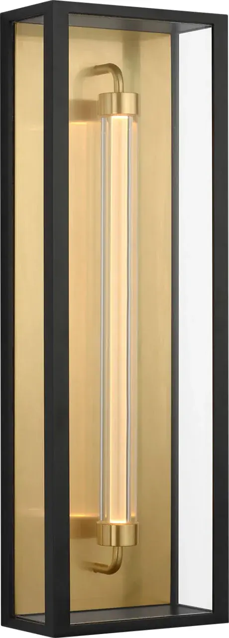 The Enferme 22" Wall Sconce by Sean Lavin brings modern architectural presence to outdoor spaces with its distinctive layered glass composition. The clear glass enclosure and inner tube soften LED light while maintaining clean definition, evoking Edison bulb warmth with contemporary performance. - alternate view