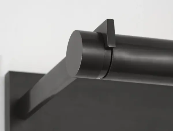 The Katan 30" picture light combines bold scale with minimalist design, featuring a pivoting cylindrical light within a rectangular frame. Ideal for large artworks and gallery walls, it delivers precise 2700K warm lighting with 90 CRI color accuracy. - alternate view