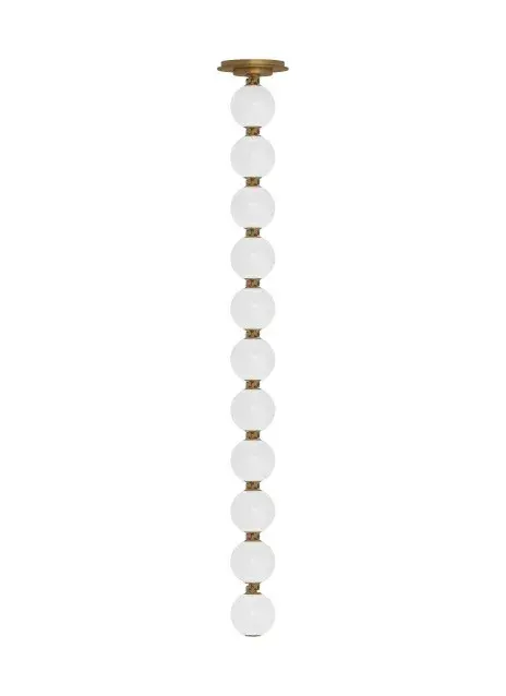 The Perle LED Pendant by Sean Lavin offers stunning design versatility with soft milk glass and natural brass connectors. Part of the popular Collier Series extension, it can be configured as a single pendant or draped chandelier.