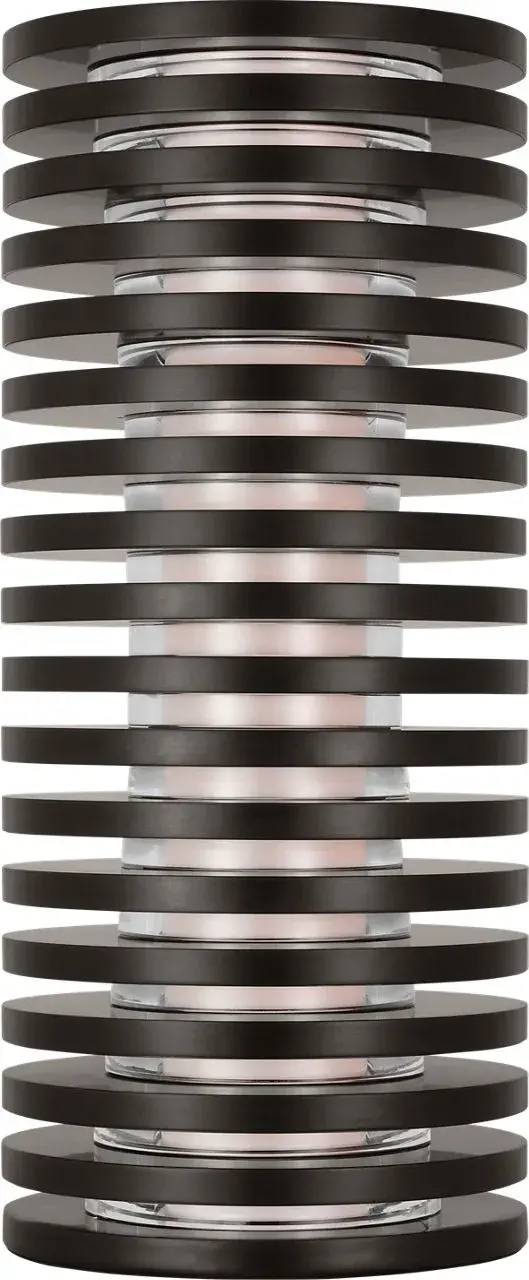 The Quoddy Small Table Lamp combines transitional design with coastal charm in a sophisticated dark bronze finish. Featuring premium 2700K warm white LED with 90 CRI for exceptional color rendering, this compact lamp delivers both style and superior light quality for intimate spaces.