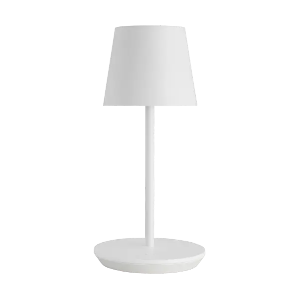 The Nevis Short by Sean Lavin combines modern design with exceptional portability. This rechargeable LED lamp offers 12-14 hours of battery life, three dimming settings, and a clean contemporary aesthetic in matte white.