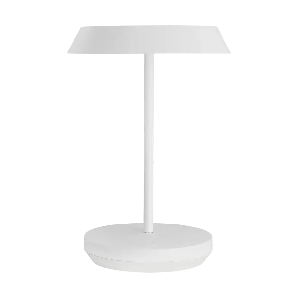 The Tepa Short by Sean Lavin delivers contemporary minimalist design with exceptional portability. Its rechargeable battery provides 12-14 hours of cordless illumination, perfect for indoor and outdoor use. The integrated 3-step touch dimmer and warm 2700K light create versatile ambiance.