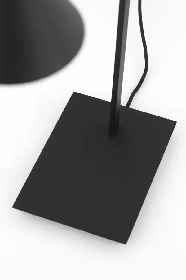 The Midrand Table Lamp transforms industrial architecture into a refined accent piece. Its conical metal form delivers focused illumination while making a bold design statement without overwhelming your space. - alternate view