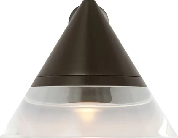 The Midrand 4" Task Sconce combines functional directional lighting with sophisticated design. Its compact conical frame and crystal diffuser deliver focused yet soft illumination, ideal for reading and workspace applications.