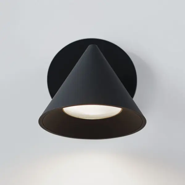 The Midrand 4" Task Sconce combines industrial-inspired design with modern functionality. Its compact 4-inch tapered shade delivers focused, directional illumination perfect for reading or accent lighting. - alternate view
