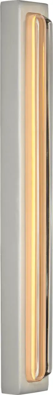 Designer Sean Lavin's Bloccare vanity light combines architectural precision with artistic illumination. The edge-lit crystal block creates even, flattering light perfect for intimate spaces and mirror flanking.