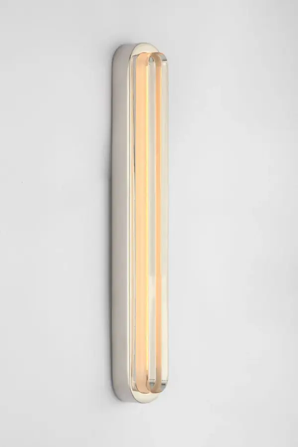 The Emera 13" Vanity by Sean Lavin delivers seamless architectural integration with its racetrack-shaped profile and edge-lit crystal diffuser. Designed for flush mounting, it creates an even, soft field of light ideal for compact spaces. - alternate view