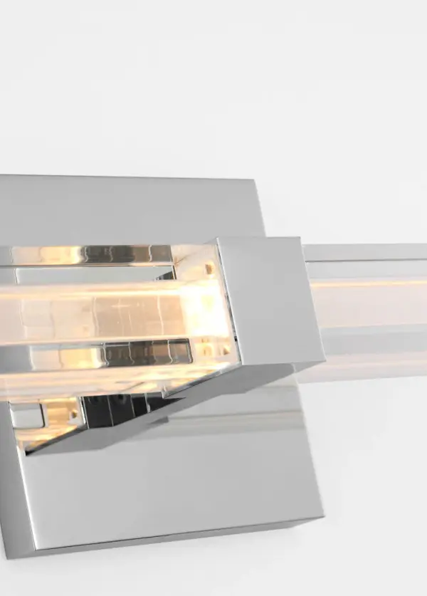 The Reiya Square 36" Vanity delivers expansive, even illumination with a refined architectural presence. Its layered glass diffuser and square backplate create visual balance, while versatile mounting options suit large-scale bath environments. - alternate view