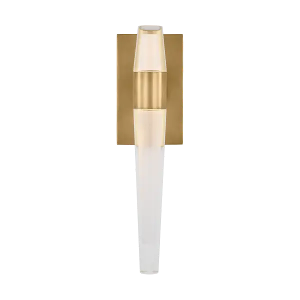 The Lassell Single Sconce combines delicate natural brass arms with laser-etched crystal tubes for a striking modern statement. Its oversized scale and minimalist design make it ideal for contemporary spaces seeking a luxurious focal point.