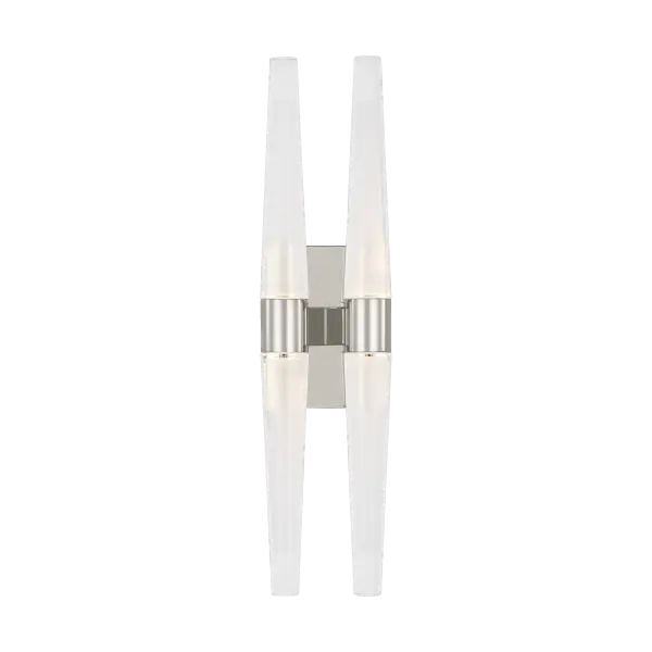 The Lassell Double Tall Sconce combines minimalist design with luxurious materials. Featuring laser-etched crystal tubes and delicate brass arms, this oversized fixture makes a bold statement in modern interiors.
