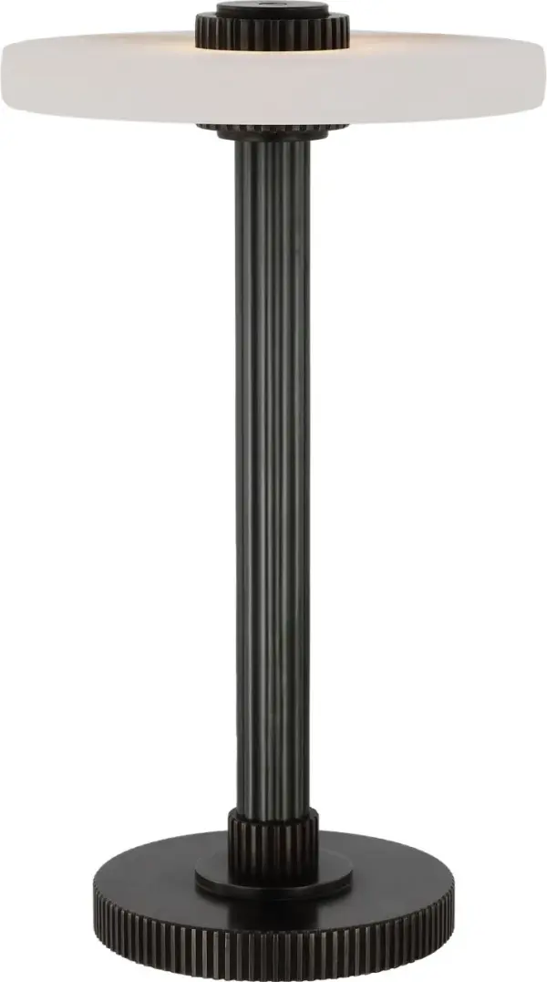 The Aran rechargeable accent lamp combines portability with sophisticated design. Its 9-inch compact profile and cordless operation make it ideal for flexible placement, while the alabaster shade provides warm, ambient lighting.