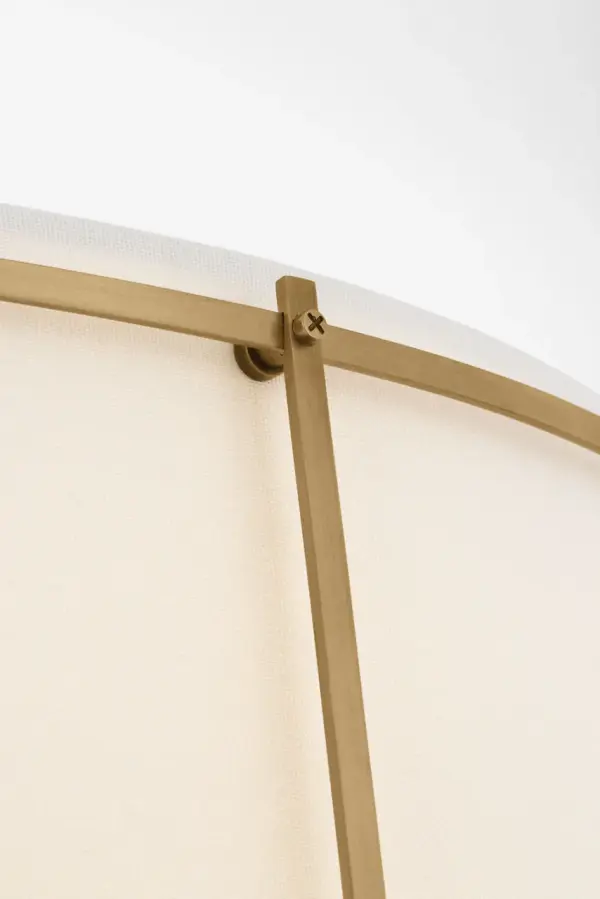The Callaway 22" flush mount combines classic brass craftsmanship with contemporary clean lines. Its hand-rubbed antique brass finish and linen drum shade create warm, diffused lighting perfect for spaces with standard ceiling heights. - alternate view