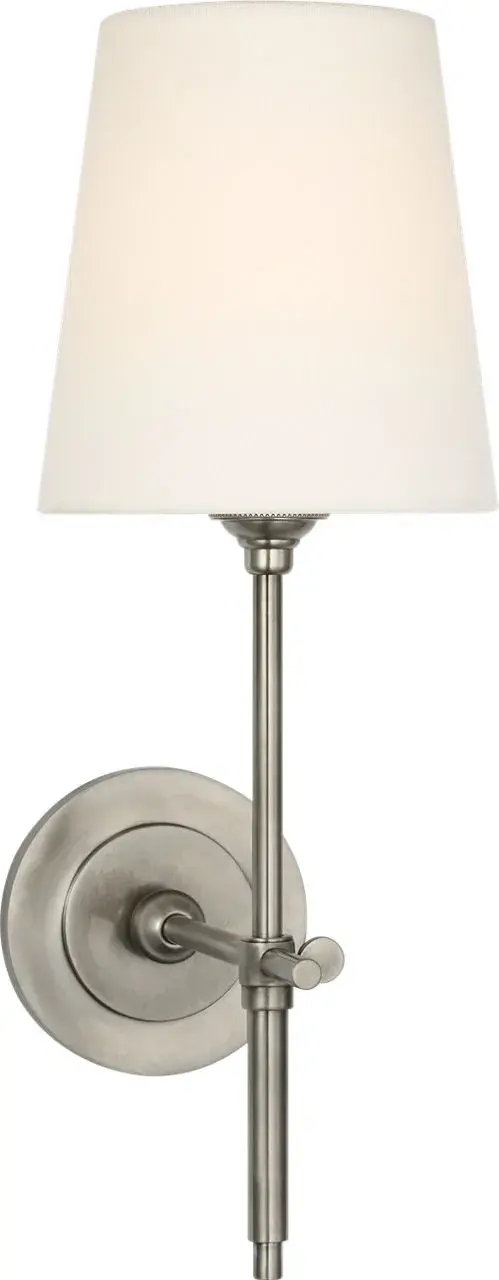 The Bryant 15" Cordless Sconce offers the perfect blend of traditional elegance and modern functionality. Its antique nickel finish and linen shade create a sophisticated look, while cordless operation provides installation flexibility.
