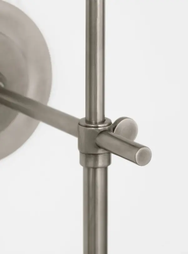 The Bryant 15" Cordless Sconce offers the perfect blend of traditional elegance and modern functionality. Its antique nickel finish and linen shade create a sophisticated look, while cordless operation provides installation flexibility. - alternate view