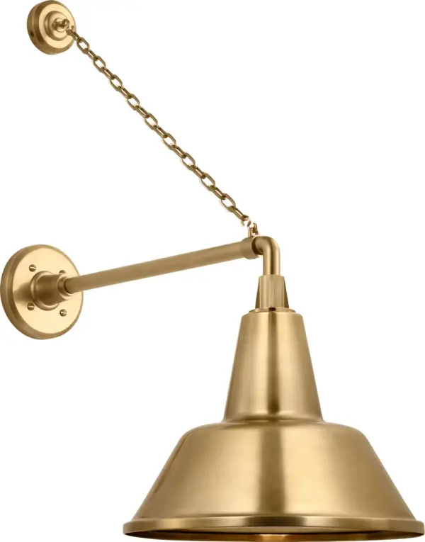 The Academy Mack Barn Light combines farmhouse charm with industrial durability. Its hand-rubbed antique brass finish and 17.5" profile deliver authentic barn-style lighting perfect for porches, patios, and commercial facades.