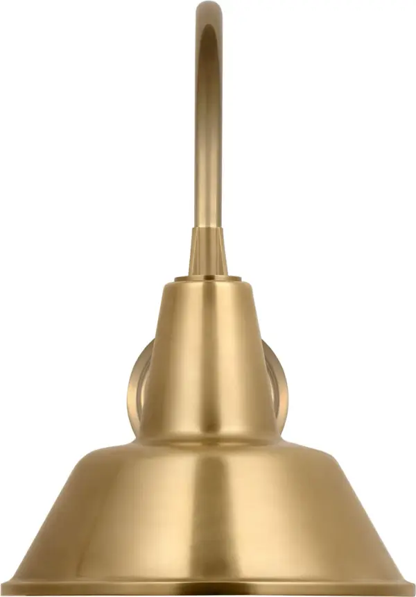 The Academy Arched Mack Barn Light brings timeless farmhouse charm to outdoor spaces with its hand-rubbed antique brass finish and traditional barn-style design. Perfect for adding character to porches, patios, and entryways.