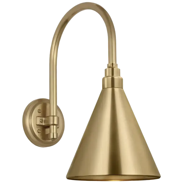 The Academy Arched Mack Barn Light combines vintage farmhouse charm with durable outdoor construction. Its hand-rubbed antique brass finish and 11-inch arched arm create authentic barn-style lighting perfect for porches, patios, and entryways.