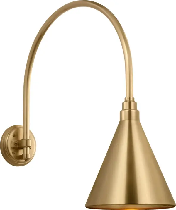 The Academy Arched Mack Barn Light brings authentic farmhouse charm to outdoor spaces with its hand-rubbed antique brass finish and distinctive conical shade. Perfect for porches, patios, and entryways.