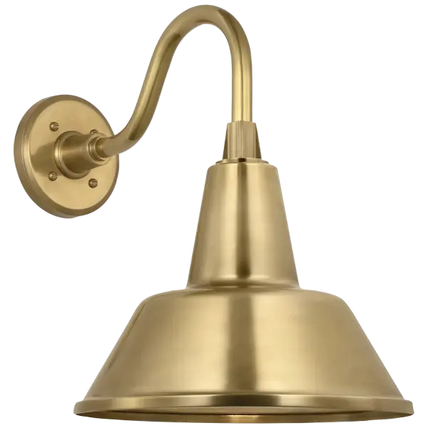 The Flynn Barn Light brings authentic farmhouse charm to outdoor spaces with its hand-rubbed antique brass finish and traditional 12.5" Bowers shade. Perfect for adding vintage character to porches, patios, and entryways.