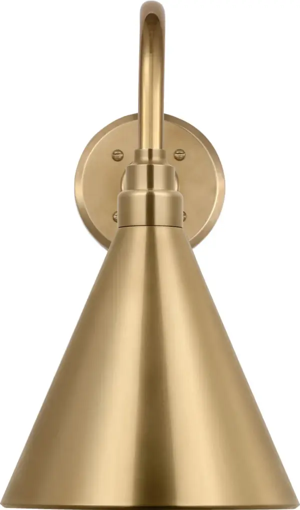 The Flynn Barn Light brings authentic farmhouse charm to outdoor spaces with its hand-rubbed antique brass finish and traditional conical shade. At 11 inches, it's perfectly sized for entryways, porches, and patios.