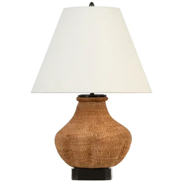 The Tahiti table lamp brings warm, organic texture to any space with its toast-finished woven base and classic linen shade. At 25" tall, it provides substantial presence while maintaining versatility across coastal and transitional interiors.
