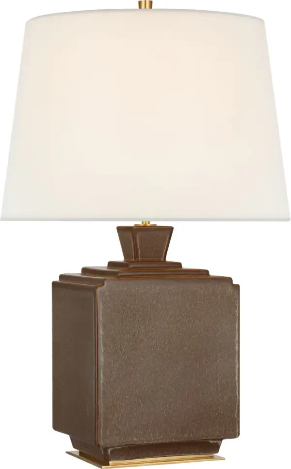 The Meurice table lamp combines sophisticated design with a soft Positano Sand finish and natural linen shade. At 27" tall, it provides ideal task and ambient lighting for bedrooms and living spaces.