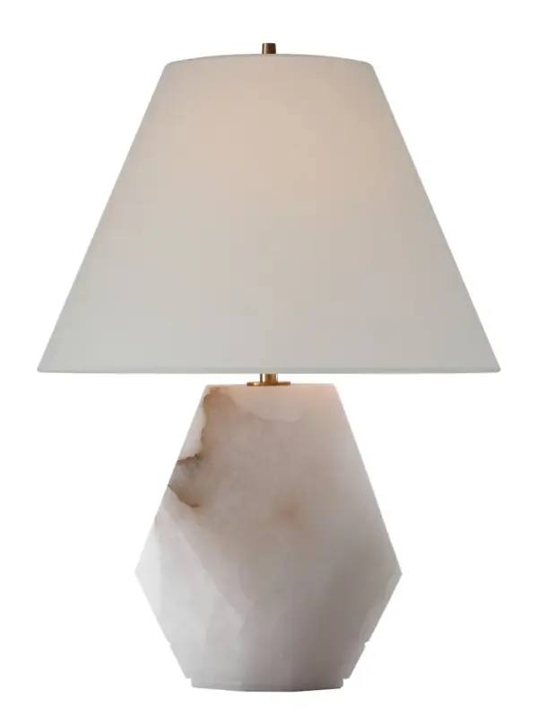 The Anthenee table lamp showcases natural alabaster stone paired with a classic linen shade, creating a refined lighting solution that bridges traditional and contemporary design sensibilities.
