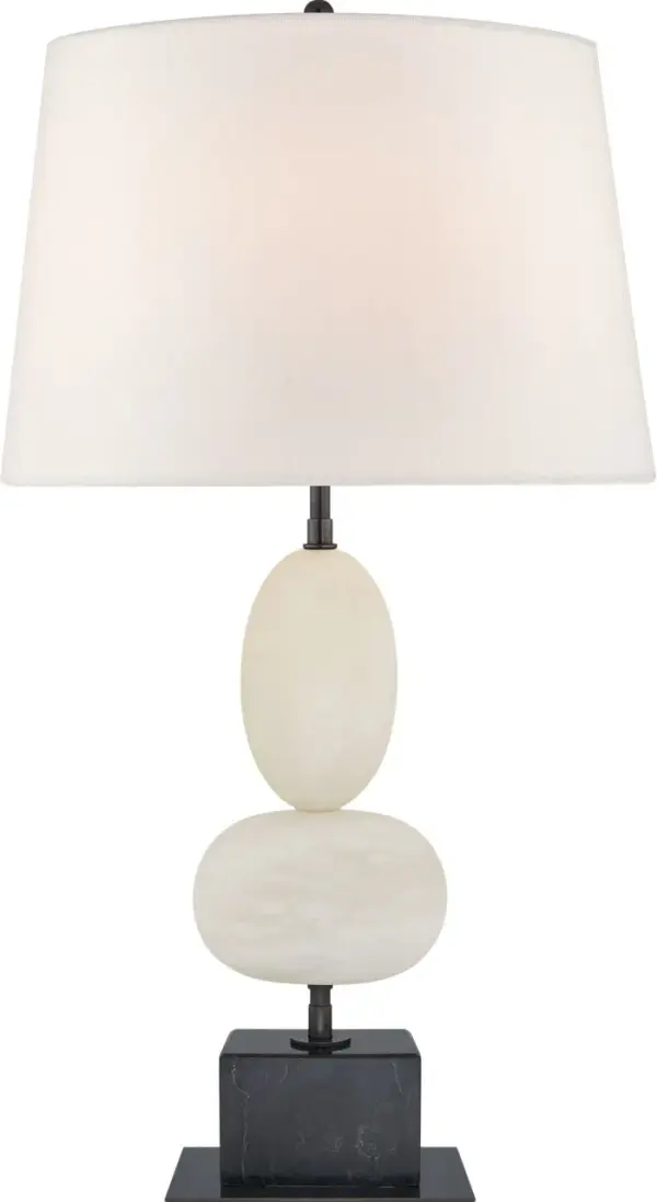 The Dani Medium Cordless Table Lamp combines the organic beauty of alabaster and black marble with modern cordless convenience. Its sophisticated material pairing and portable design make it perfect for flexible lighting solutions.