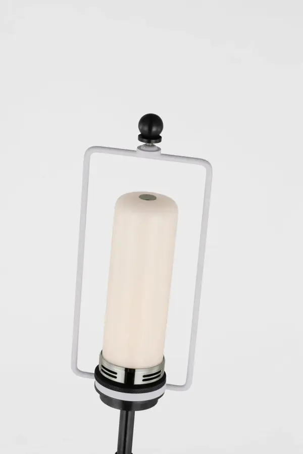 The Dani Medium Cordless Table Lamp combines the organic beauty of alabaster and black marble with modern cordless convenience. Its sophisticated material pairing and portable design make it perfect for flexible lighting solutions. - alternate view