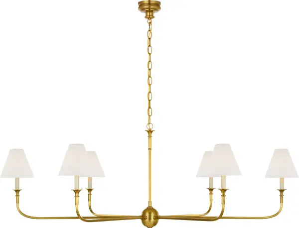 The Piaf Grande brings sophisticated illumination to spacious interiors with its hand-rubbed antique brass frame and soft linen shades. This substantial chandelier balances traditional craftsmanship with transitional design. - alternate view