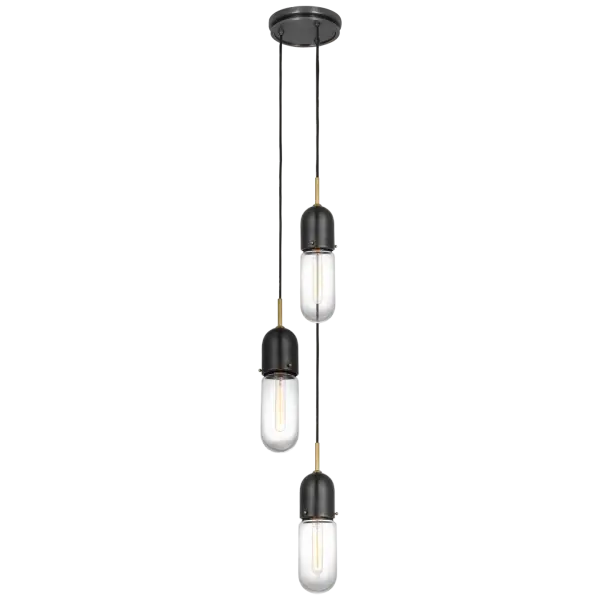 The Junio 3-Light Pendant combines bronze and brass finishes with clear glass shades for a refined, versatile look. Its transitional design bridges traditional and contemporary styles, making it adaptable to various interiors.