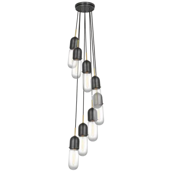 The Junio 8-Light Pendant combines bronze and brass finishes with clear glass for a sophisticated transitional look. Its substantial size and eight light sources make it perfect for large dining rooms or grand entryways.