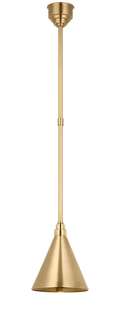 The Academy Pendant combines traditional styling with outdoor durability. Its hand-rubbed antique brass finish and 9-inch conical Savannah shade create warm, inviting illumination for covered outdoor spaces.