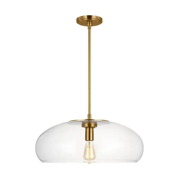 Thomas O'Brien's Largo pendant transforms a 1960s Danish ceramic dish into a striking steel and glass fixture. The burnished brass finish glows through clear glass, creating a warm focal point perfect for dining or kitchen spaces.