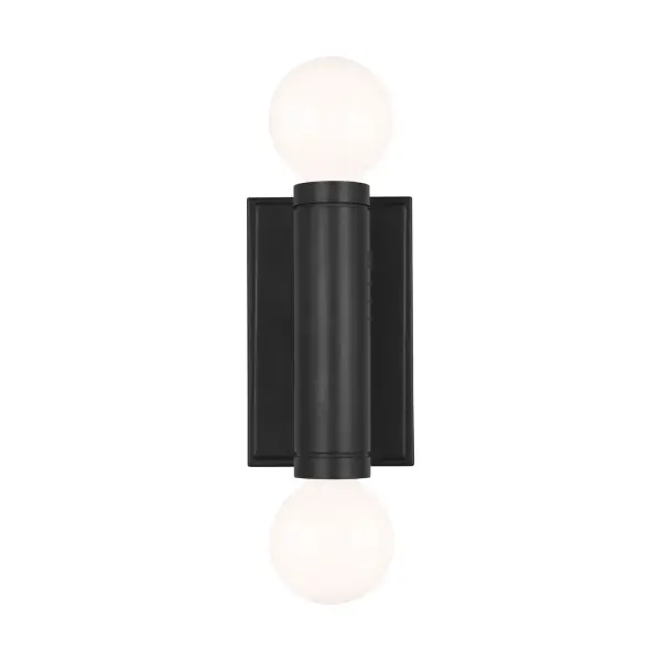 The Beckham Modern sconce by Thomas O'Brien combines clean vertical lines with dual globe shades for a refined, architectural look. The Aged Iron finish adds industrial elegance while the compact 4.5" profile works beautifully in tight spaces.