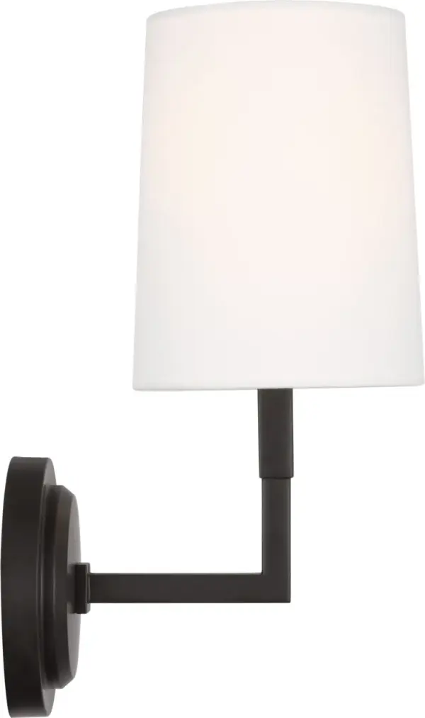 The Danica Small Sconce brings traditional elegance to compact spaces with its aged iron finish. Perfect for hallways, bathrooms, and powder rooms where space is limited but style matters.