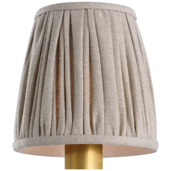 This 4-inch pleated natural linen shade offers an easy, elegant way to refresh existing fixtures. The neutral fabric complements various décor styles while softening light beautifully.