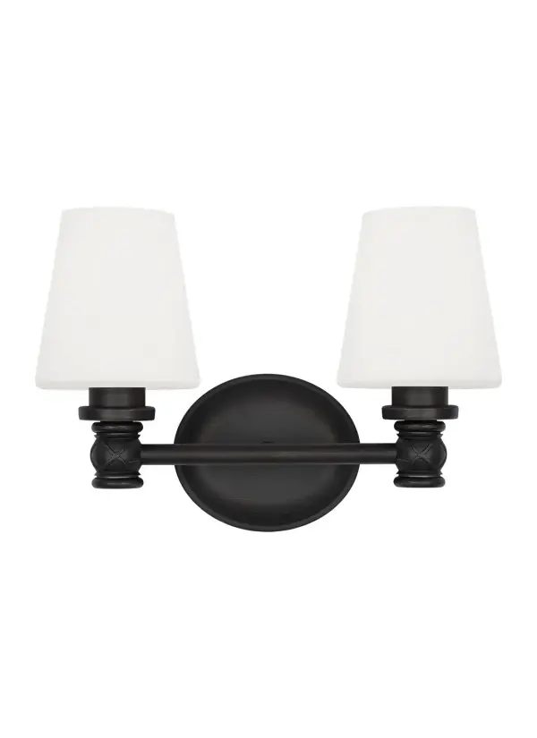 The Xavierre vanity fixture by designer Sean Lavin brings understated sophistication to bath spaces with its subtle X-detail base and aged iron finish. The opal etched glass provides soft, even illumination perfect for grooming tasks.