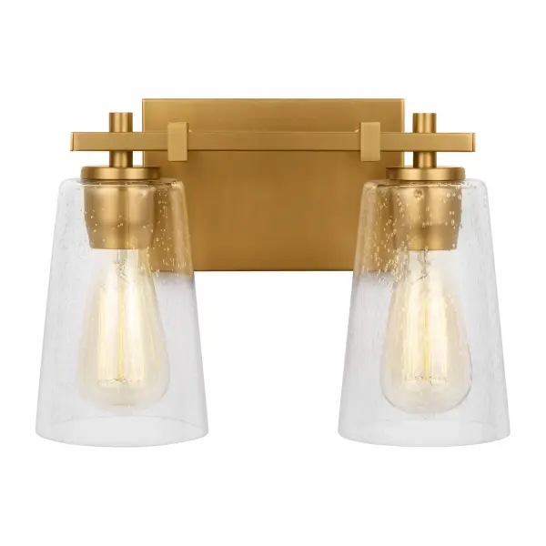 Modern details, like the clean square supports of the cross arm and sleek, rectangular backplate, are defining features of the Mercer. Available in five modern finishes and thickened seeded glass shades, this Mercer vanity lights create a delicately gorgeous effect by illuminating your space with a subtle glow. Collection: Mercer Designer: Sean Lavin Rooms: Bathroom, Bedroom, Entry Room/Hallway Finish: Burnished Brass Glass: Clear Seeded Width: 12.50" Height: 8.88" Length: 6.88" Weight: 3.50 lb Extension from Wall: 6.88" Wire: 8" Black/White Canopy: DP:0.875'' W:7.5'' H:5'' OB UP:6.375'' OB DOWN:2.5'' Rectangular Number of Bulbs: 2 Maximum Wattage: 60.00 W Bulb Type: A19 Bulb Base: Medium Voltage: 120.00 V Material: Steel Country of Origin: Phillippines Safety Listing: cETL Safety Rating: Damp Spec Sheet Instructions