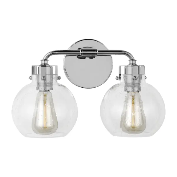 The Clara vanity fixture combines contemporary style with functional lighting. Clear seeded glass shades create visual interest while allowing exposed bulbs to become a design feature. Compact sizing works well in standard bathrooms.