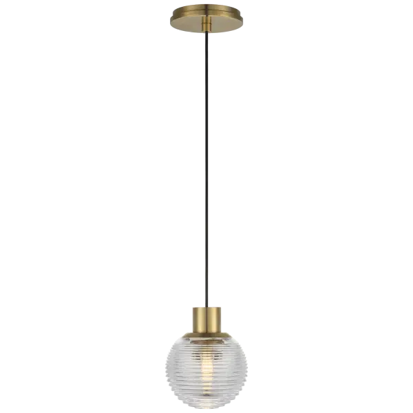 The Circon mini pendant combines the warmth of natural brass with the brilliance of clear crystal in a compact 5-inch design. Perfect for multiples over islands or as accent lighting in smaller spaces.