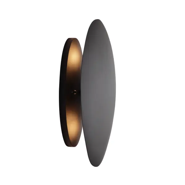 The Metalo Misto wall sconce combines contemporary styling with industrial materials in a compact design. Its coal black steel finish adds dramatic contrast while the dual candelabra bulbs provide warm ambient lighting. - alternate view