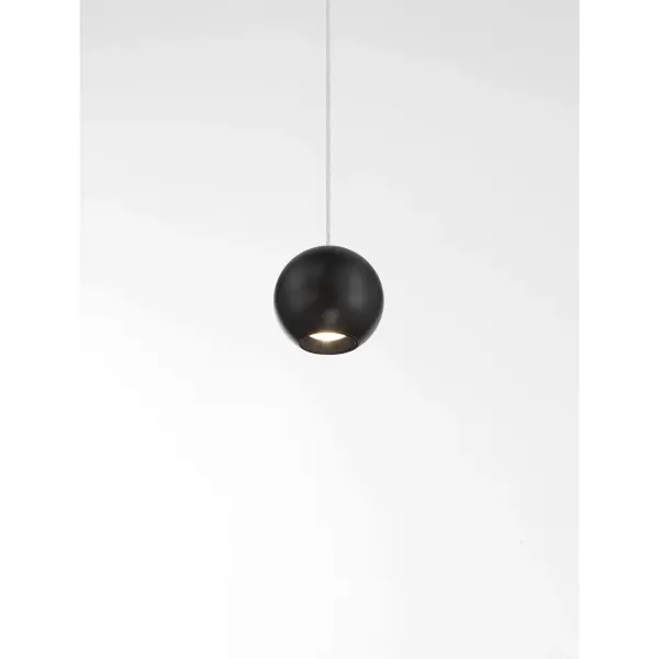 The Itty mini pendant delivers focused LED illumination in an ultra-compact 2-inch design. Its coal black finish and modern aesthetic make it ideal for multiples over kitchen islands or as accent lighting in tight spaces. - alternate view